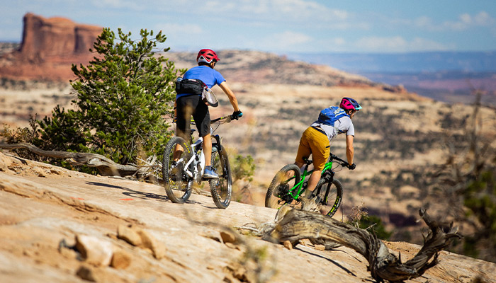 moab11 2 mountain bikers riding around Moab Utah.